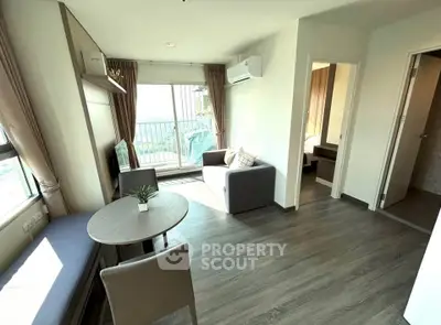 Modern living room with balcony view in a stylish apartment