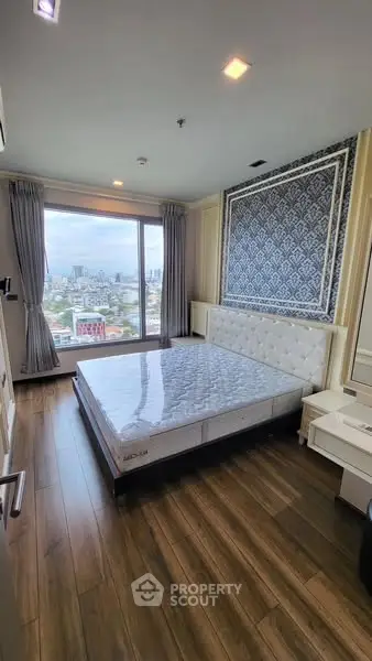 Luxurious bedroom with city view and elegant decor