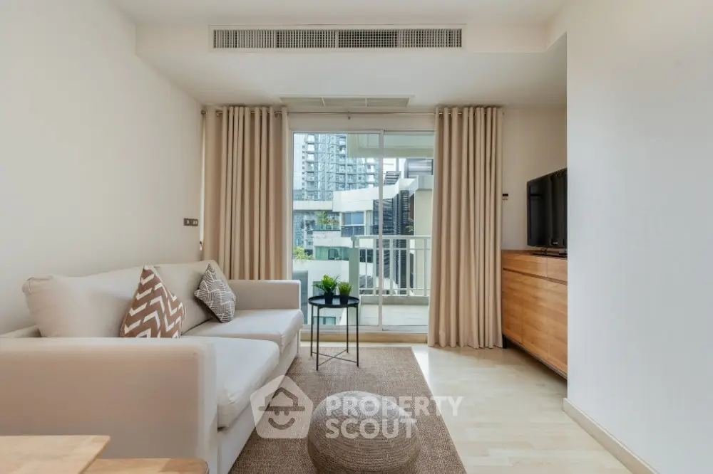 Modern living room with balcony view in urban apartment