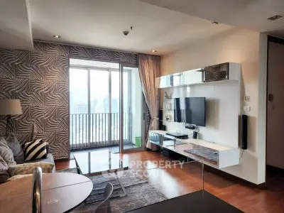 Modern living room with stylish decor and city view balcony