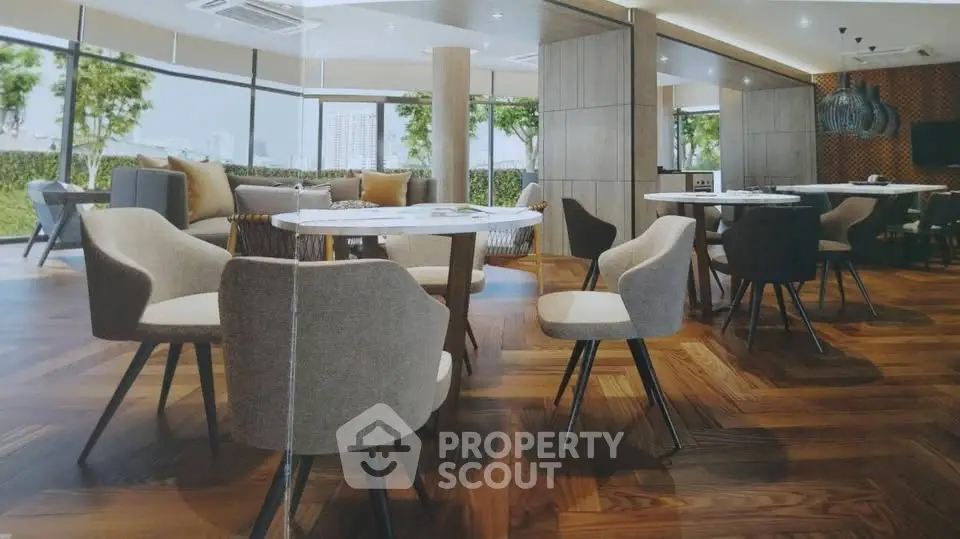 Luxurious modern lounge with elegant seating and panoramic views, perfect for relaxation and social gatherings.