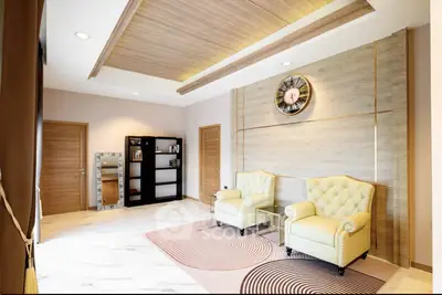 Elegant living room with plush armchairs and stylish decor