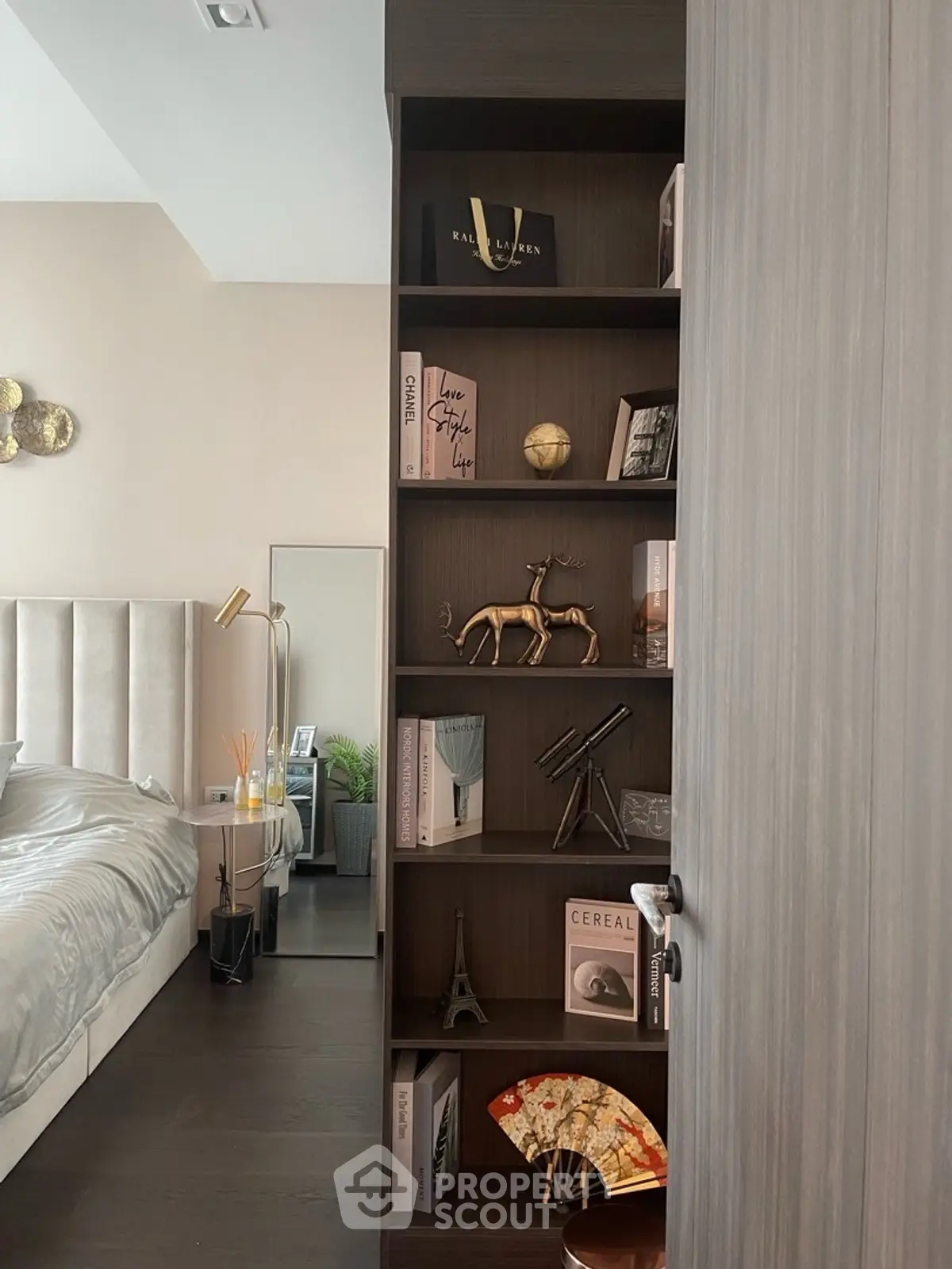 Stylish bedroom with elegant shelving and modern decor accents