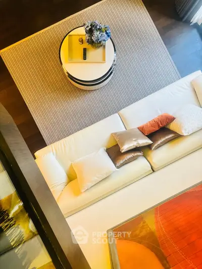 Luxurious modern living room with elegant decor and plush seating, perfect for relaxation and entertaining.