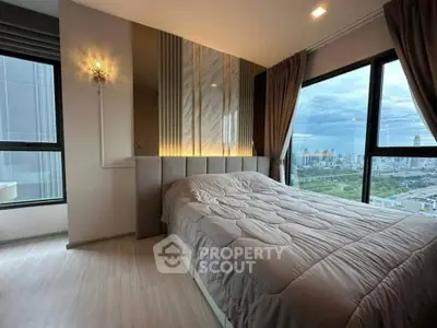 Luxurious bedroom with stunning city view and elegant decor