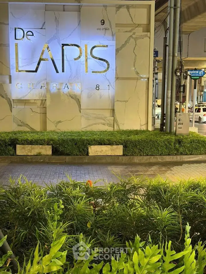 Elegant exterior view of De Lapis building with lush greenery and modern design.