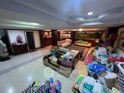 Spacious living room with cozy seating and vibrant decor