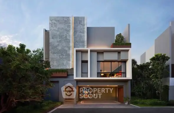 Modern architectural home exterior with sleek design and lush greenery.