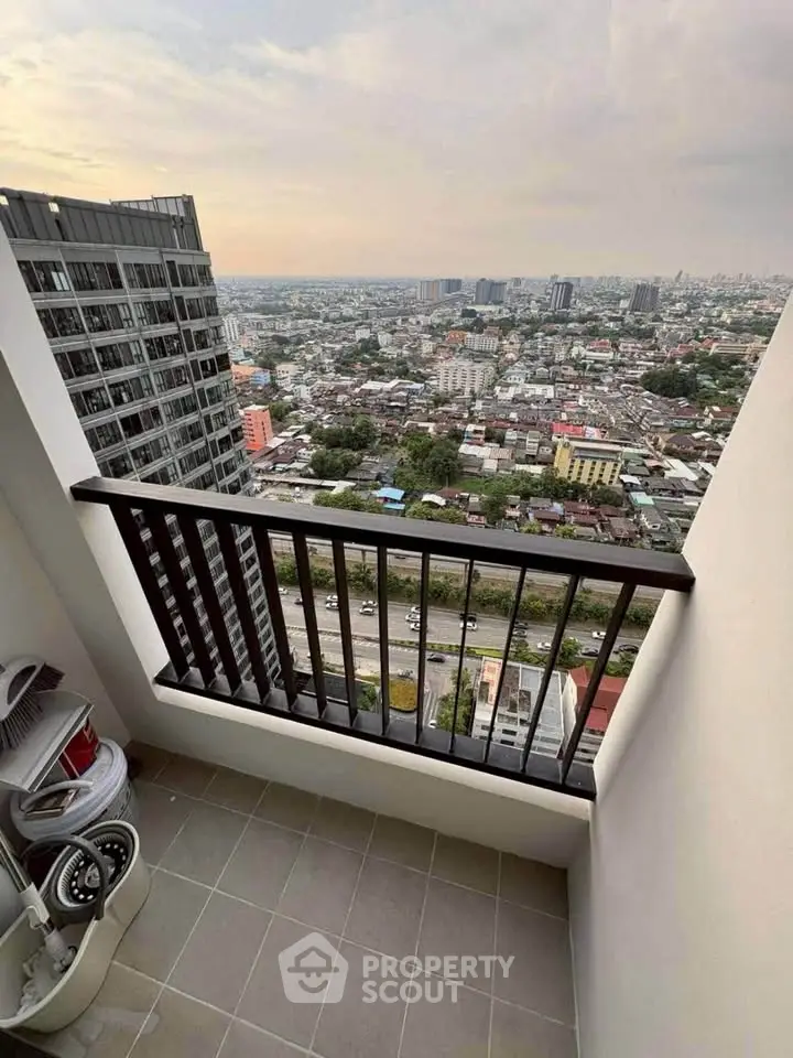 Stunning city view from a high-rise balcony, perfect for urban living enthusiasts.