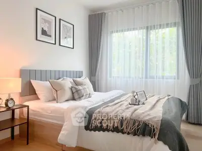Cozy and stylish bedroom with modern decor and natural light