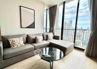 Modern living room with panoramic city view and stylish decor