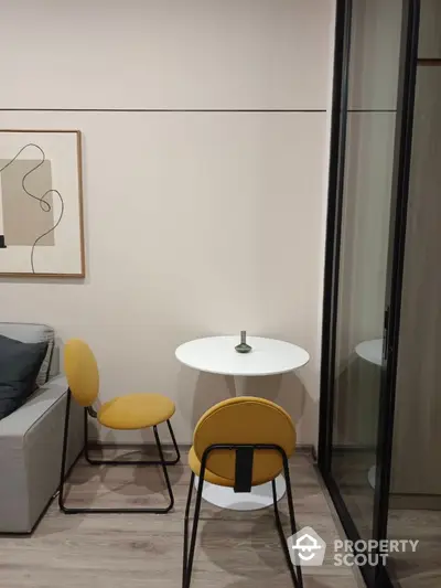 Modern interior with stylish yellow chairs and minimalist decor