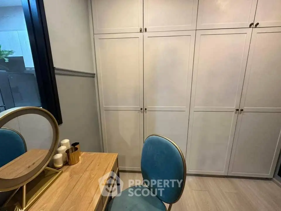 Stylish bedroom with modern wardrobe and elegant vanity setup