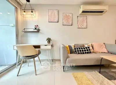 Modern living room with stylish decor, featuring a cozy sofa, chic desk, and wall art, perfect for urban living.