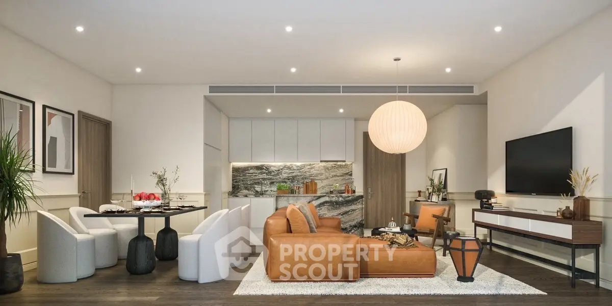 Luxurious open-plan living room with modern decor and stylish kitchen