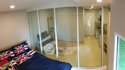 Modern bedroom with glass partition and stylish decor