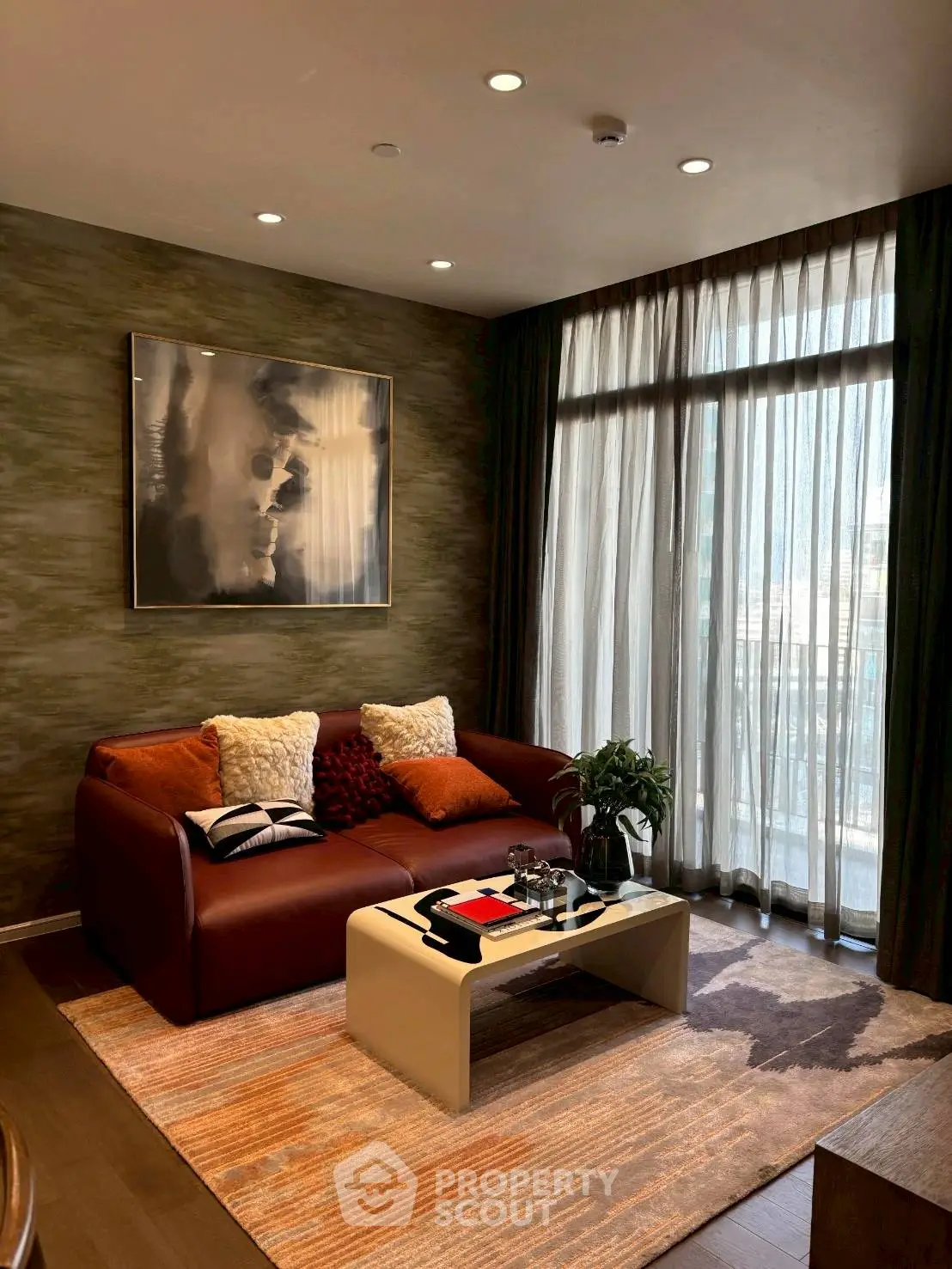 Stylish living room with modern decor and large window for natural light