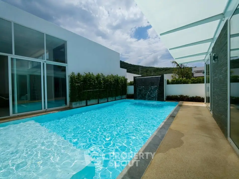 Luxurious modern villa with private pool and stunning mountain views, perfect for relaxation and entertainment.