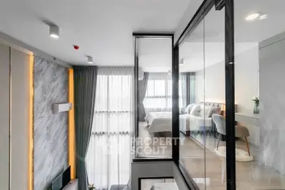 Modern duplex bedroom with floor-to-ceiling windows and stylish decor