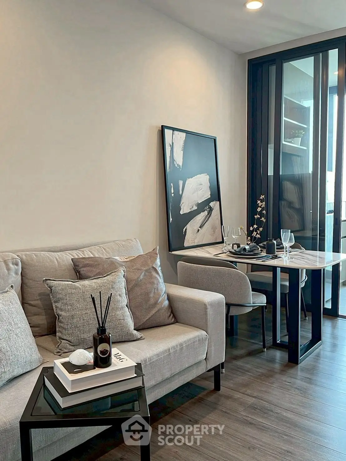Modern living room with stylish decor and cozy seating area, perfect for relaxation and entertaining.