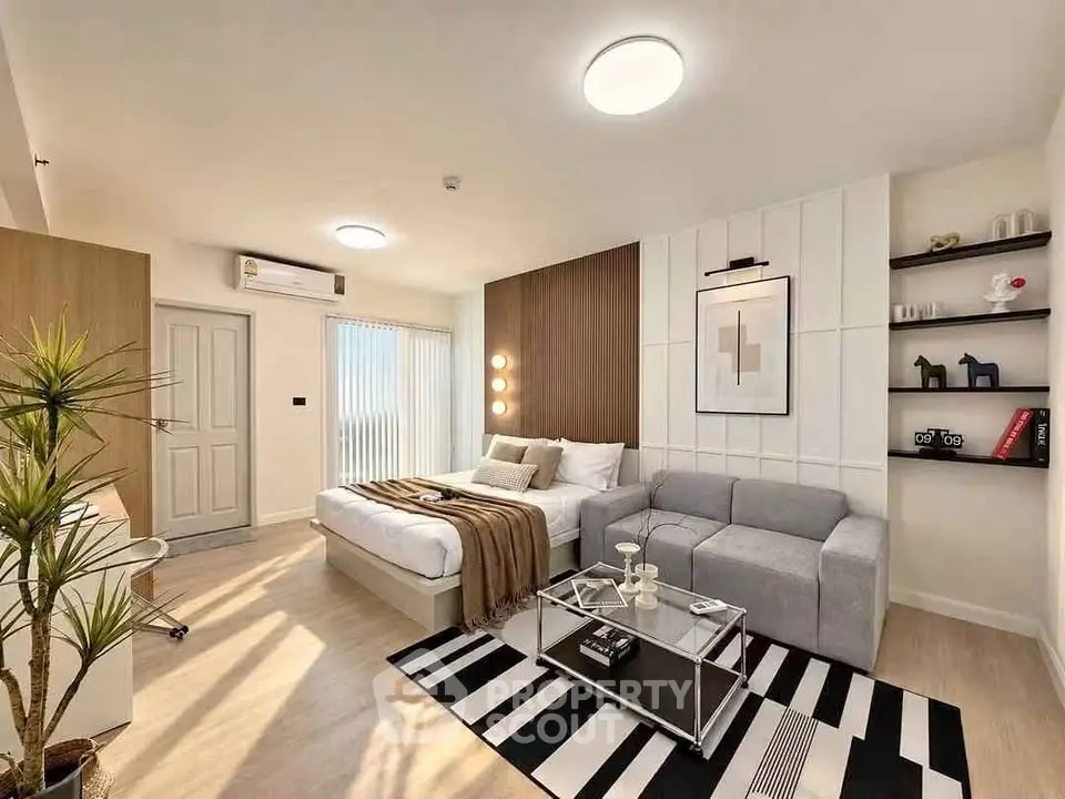 Modern studio apartment with stylish decor and cozy living area