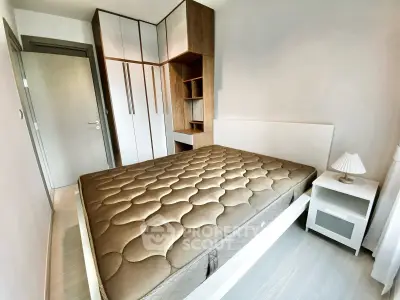 Modern bedroom with stylish built-in wardrobe and cozy lighting
