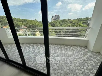 Spacious balcony with scenic view of lush greenery and cityscape