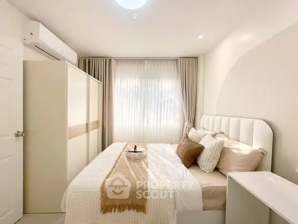 Cozy and bright bedroom with modern decor and natural light