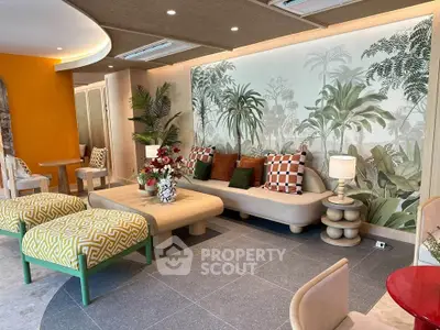 Stylish living room with tropical wallpaper and modern furniture