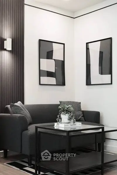 Modern living room with stylish decor and cozy seating area.