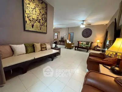 Spacious living room with elegant decor and comfortable seating in a modern home.