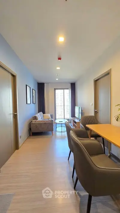 Modern living room with cozy seating and natural light