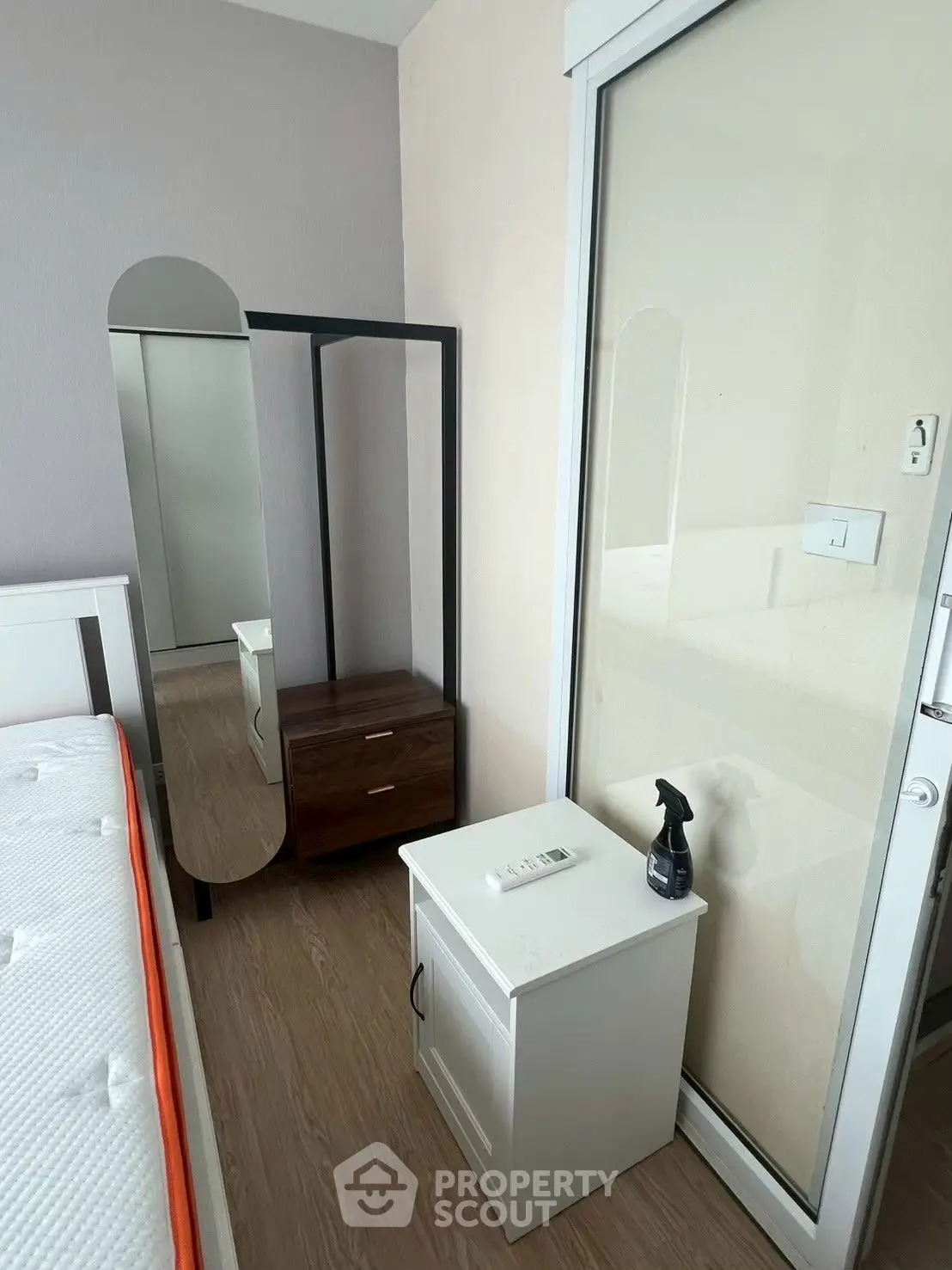 Modern bedroom with sleek design and ample natural light