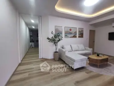 Modern living room with stylish decor and cozy seating area