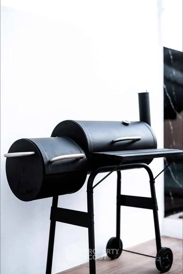 Modern outdoor BBQ grill on a stylish patio setting