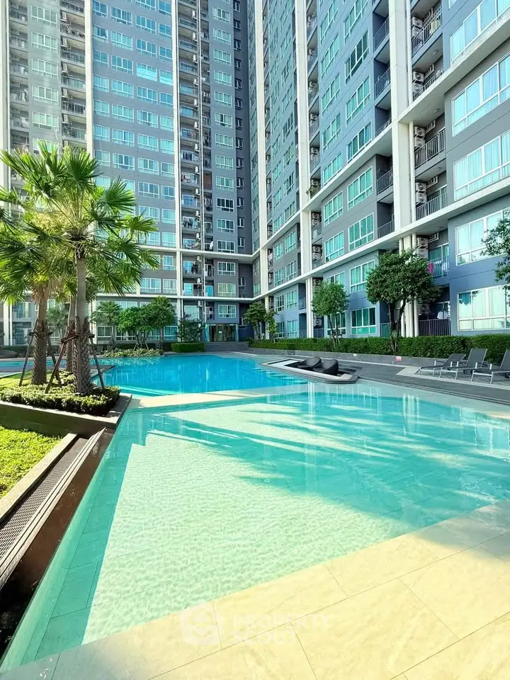 Luxurious condominium with stunning pool and modern architecture