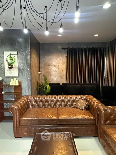 Luxurious living room with elegant leather sofa and modern lighting