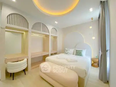 Luxurious modern bedroom with elegant lighting and stylish decor