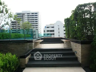 Luxurious rooftop garden with modern design and city views, perfect for relaxation and entertainment.