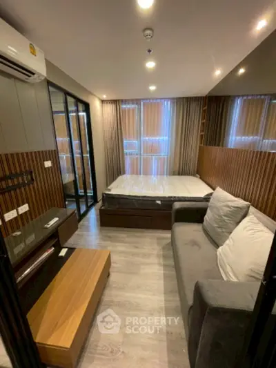 Modern compact bedroom with stylish decor and cozy ambiance