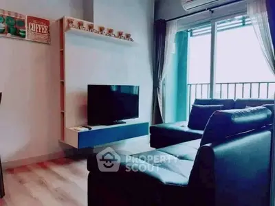 Modern living room with sleek furniture and large window balcony view.