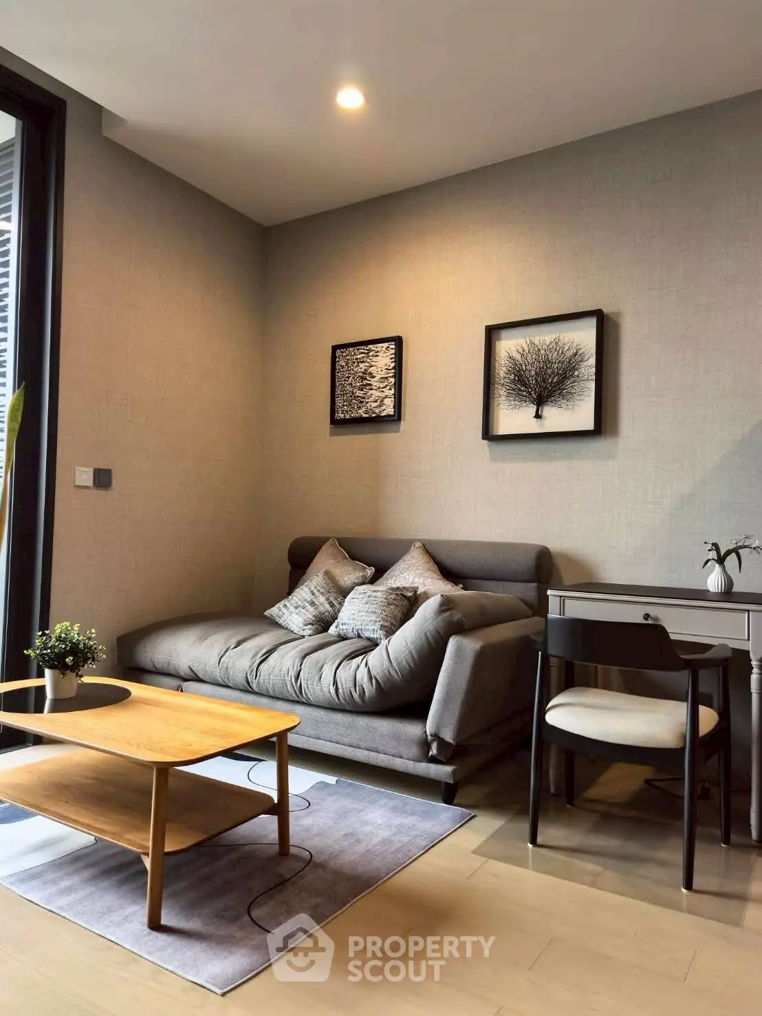 Cozy modern living room with stylish sofa and elegant decor