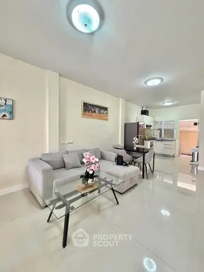 Modern living room with sleek furniture and open layout