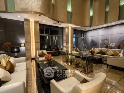Luxurious living room with elegant decor and plush seating in a high-end apartment.