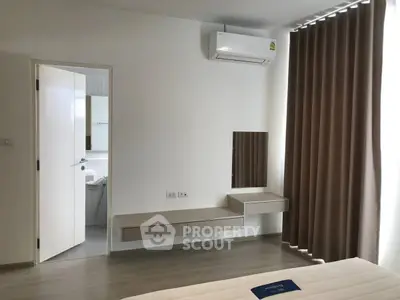 Modern bedroom with air conditioning and minimalist furniture design