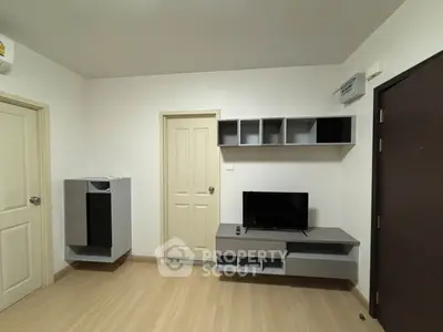 Modern living room with minimalist design and mounted TV unit