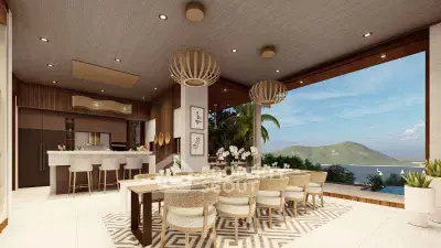 Luxurious open-plan dining area with stunning ocean view and modern decor