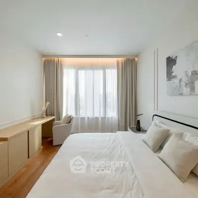 Modern bedroom with elegant decor and natural light