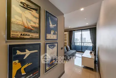 Stylish modern living room with city view and vintage aviation posters