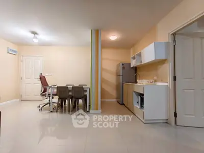 Spacious open-plan living area with modern kitchen and dining space